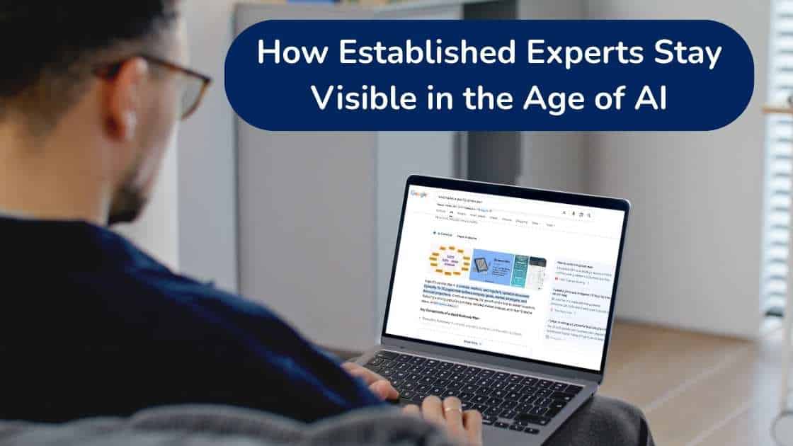 Professional reviewing AI search results on a laptop, illustrating how experts stay visible in AI search