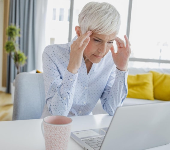 business-woman-looking-at her-computer-identifying-her-expertise-to-enquiry-gap Business woman studying her expertise to enquiry gap on her laptop
