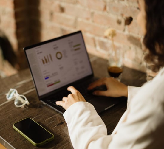 what-the-expertise-to-enquiry-gap-costs-you business woman looking at some analytics recoginising what the expertise to enquiry gap is costing